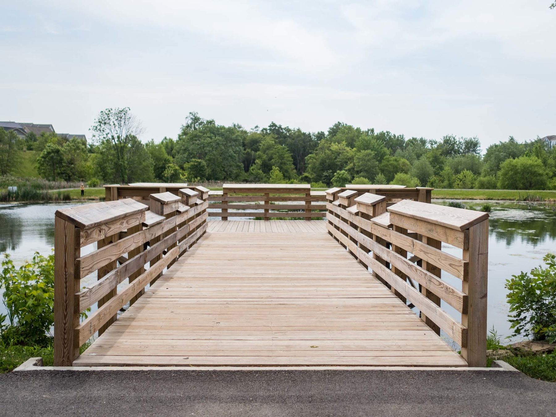 accesible fishing dock with timber deck and rails.