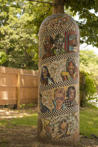 Faces of Flower Avenue totem pole at Flower Avenue Urban Park