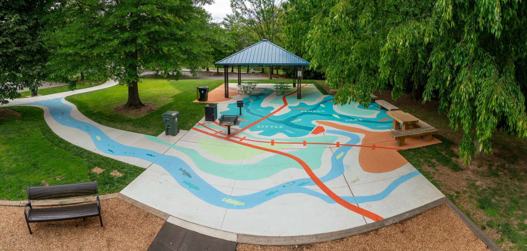 Aerial view of the picnic shelters, grill, and floor mural at Waters Landing.