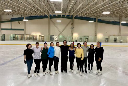 Skaters posing in a line