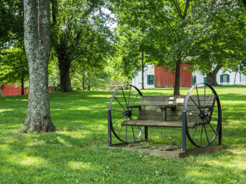 Bench with wagon wheels at Agricultural History Farm Park