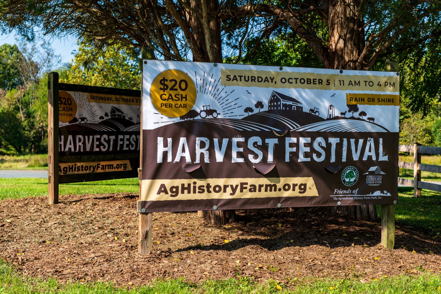 The sign for Harvest Festival at the entrance of the park 