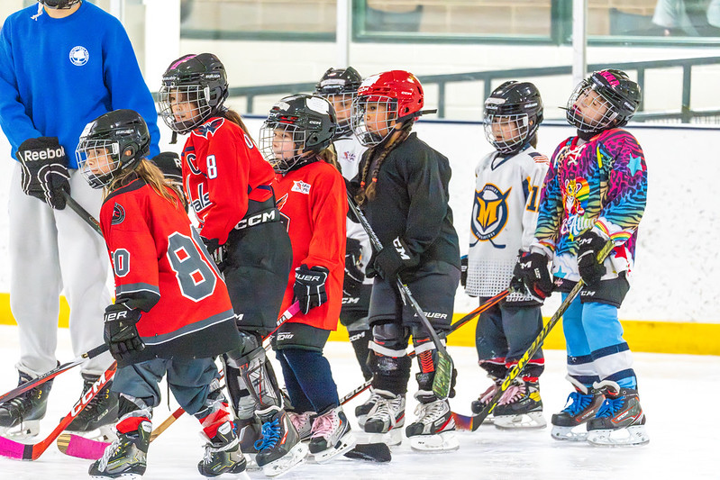 Row of girls lined up at hockey class