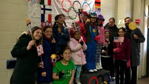 Olympic Day - Skaters Standing on Podiums