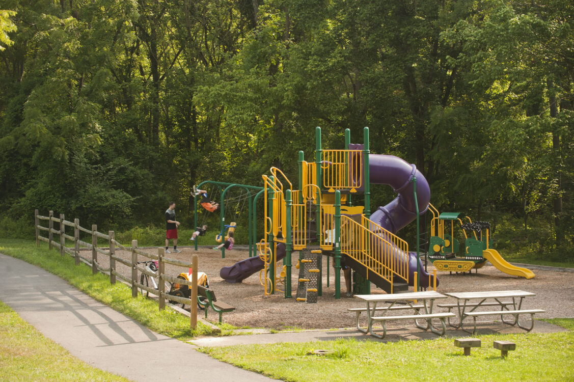 Children playing at Playground at Jones Mill Road Neighborhood Park
