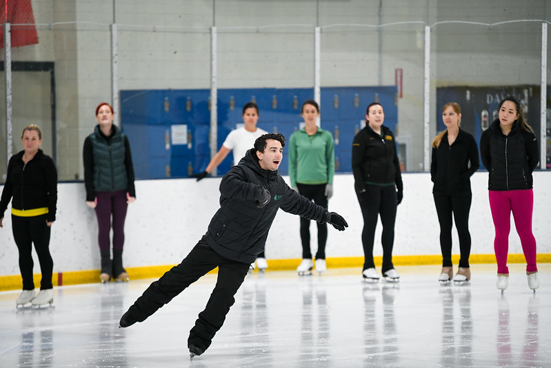 Max demonstrating exercise for adult skaters