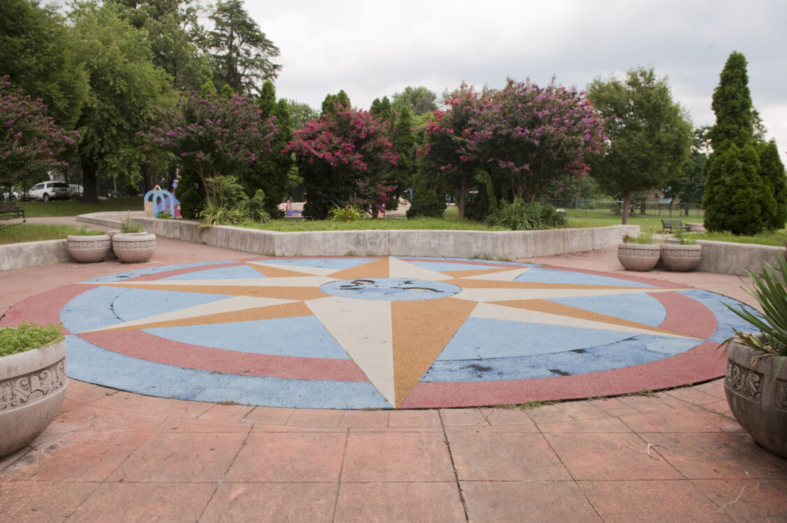 Roundabout with compas decoration New Hampshire Estates Neighborhood Park