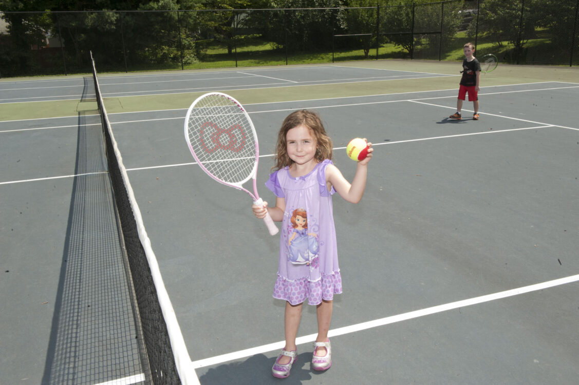 Children playing Tennis at Pinecrest Local Park