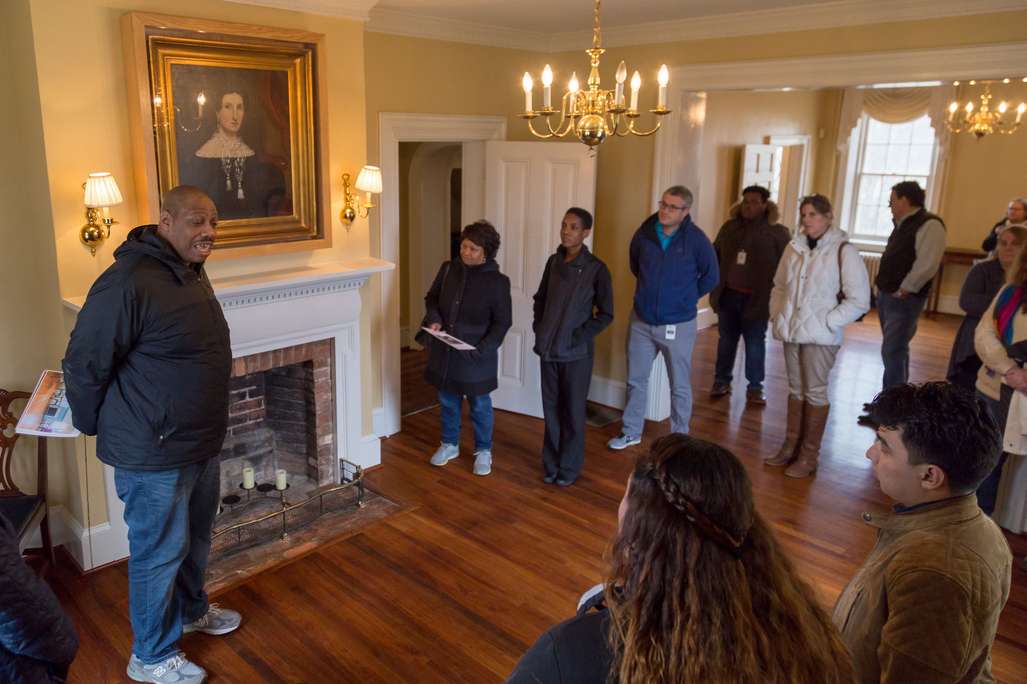 Woodlawn Manor House, group tour inside den.