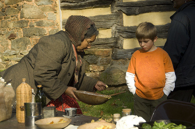 Historic foodways demonstration at Oakley Cabin African American Museum and Park