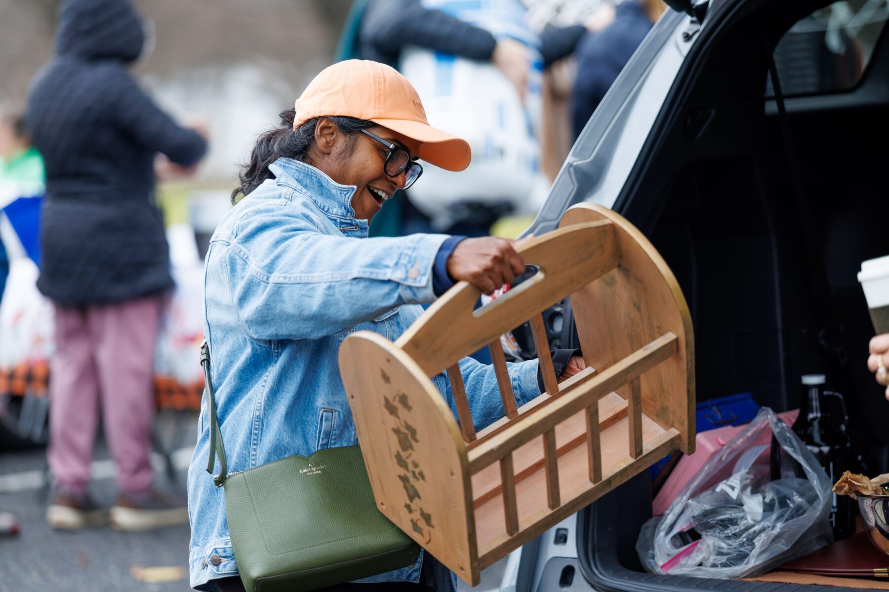 Lady smiling holding basket