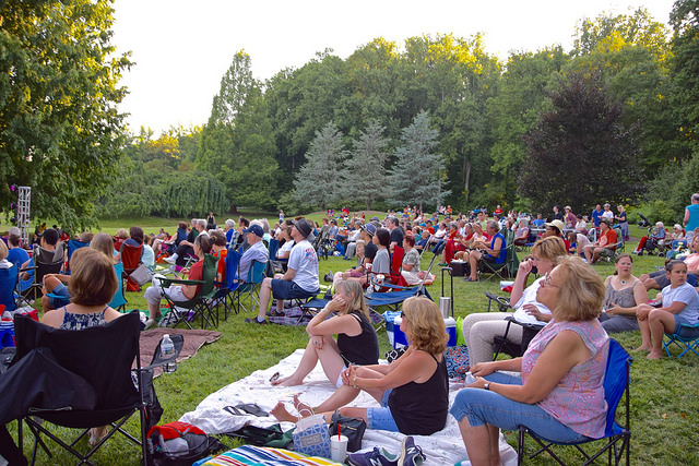 People sitting on Lawn at Brookside Gardens