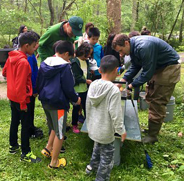 Student learn about water quality at Maydale Nature Classroom field trip