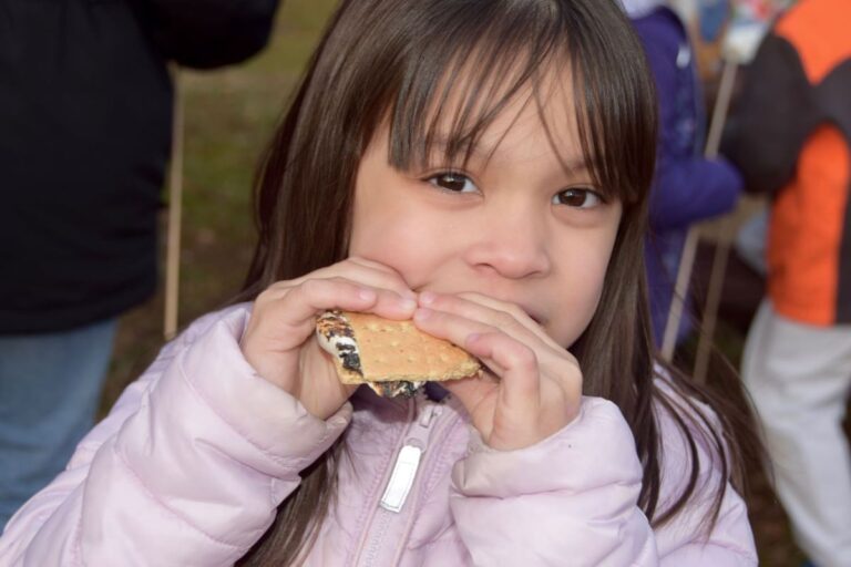 Girl eating S'mores