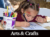 photo of a young girl doing a craft with a black bar at the bottom that has white letters that says Arts and Crafts