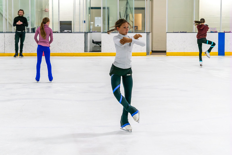 Girl doing a spin on the ice