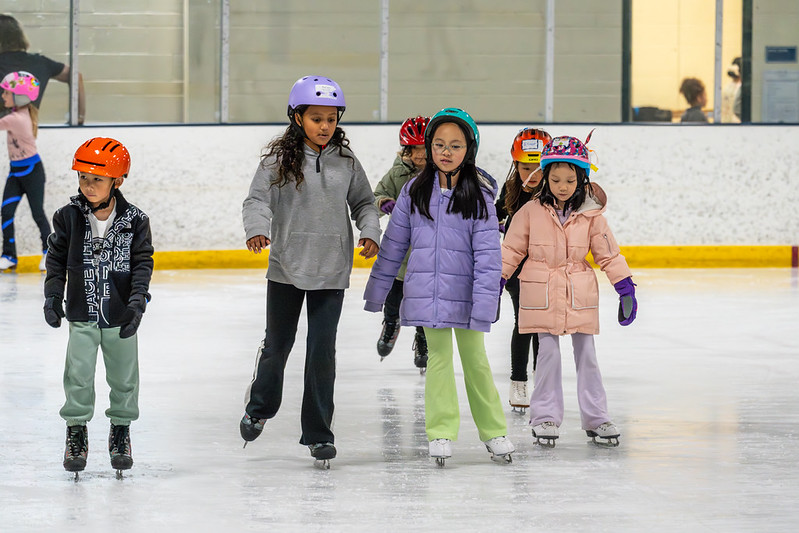 Group of children ice skating