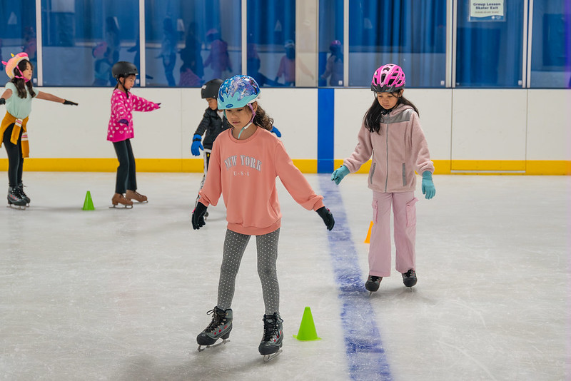 Girls ice skating