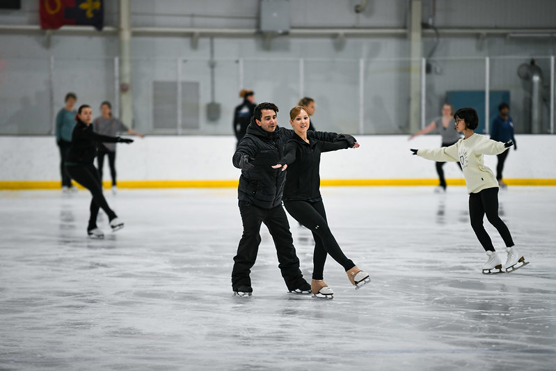 Max instructing an adult skater.