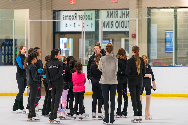 Mariah instructing a group of skaters