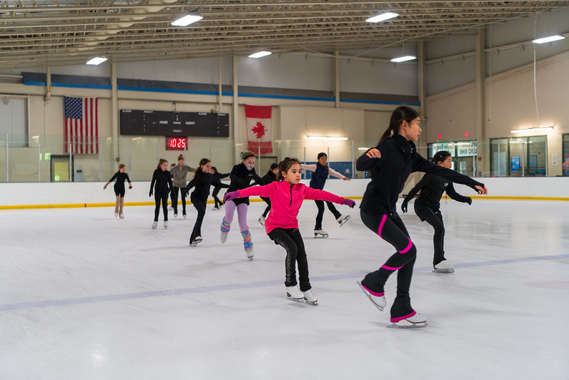 Skaters warming up on the ice