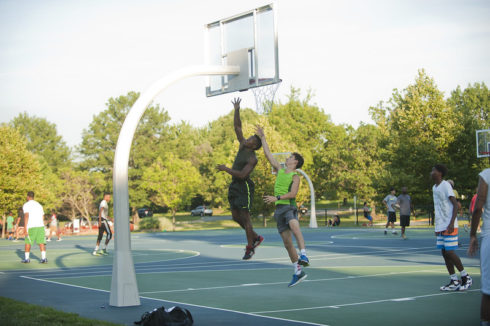 two men playing basketball