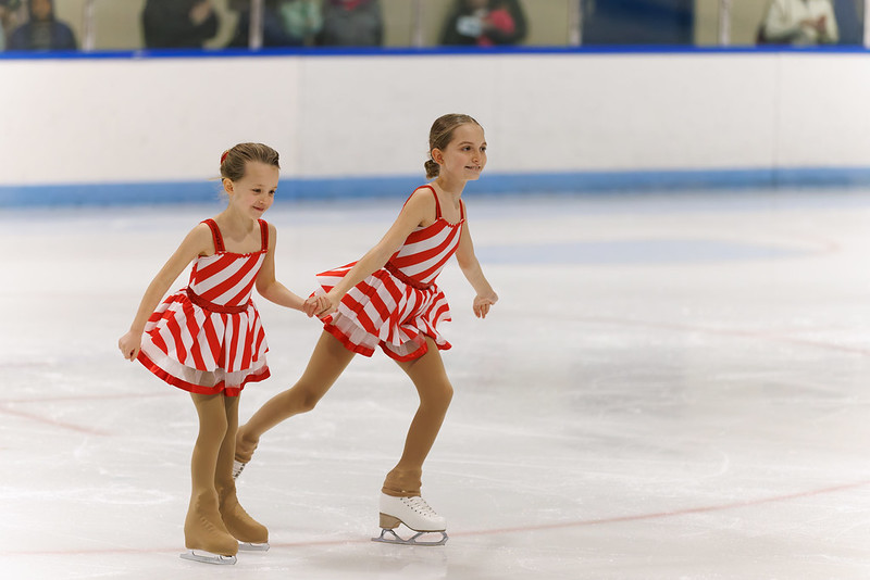 Two skaters performing in the ice show