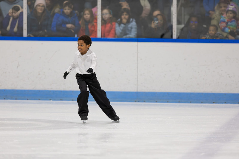 Boy skating in the ice show