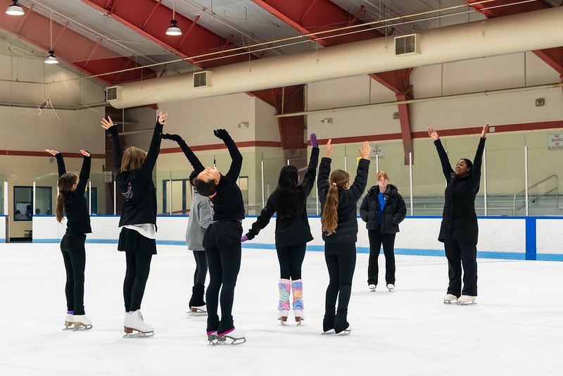 Instructor leading a skating class