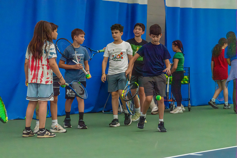 Group of children at tennis camp