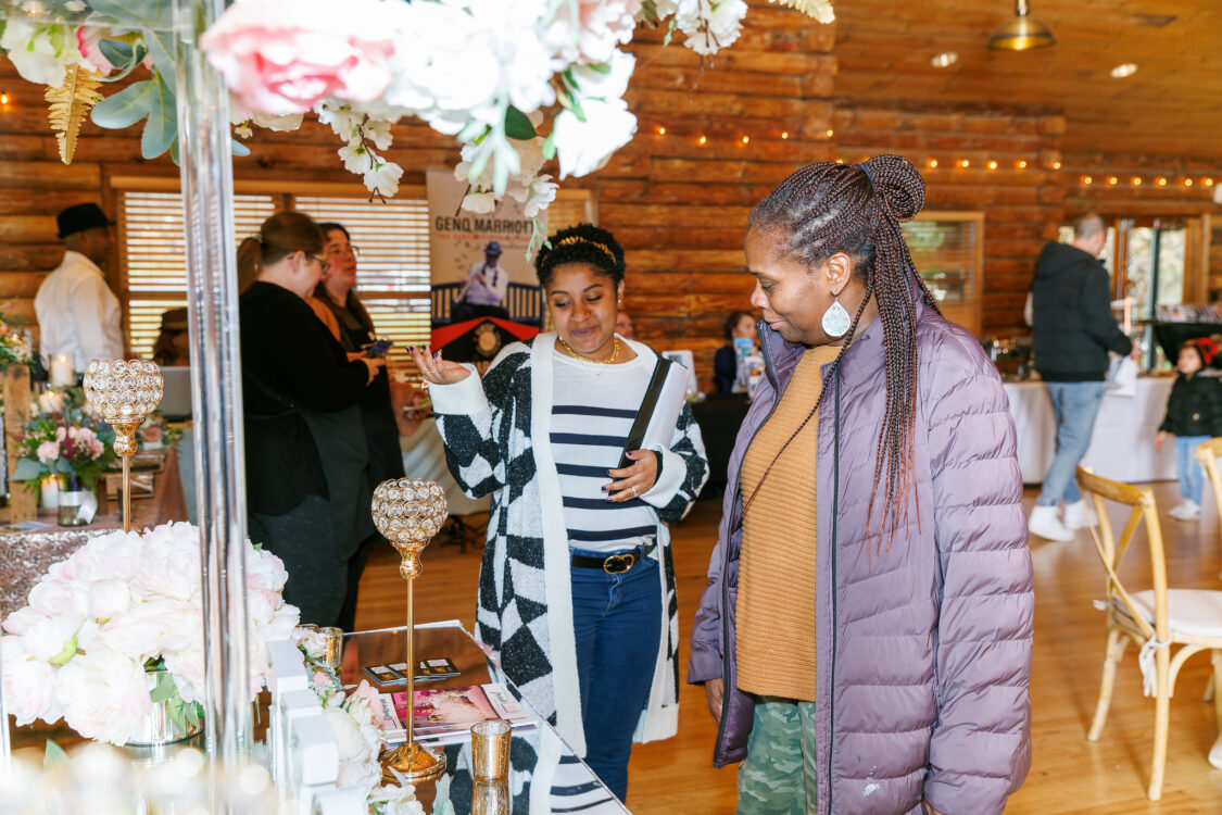 open house visitors looking at table setting ideas