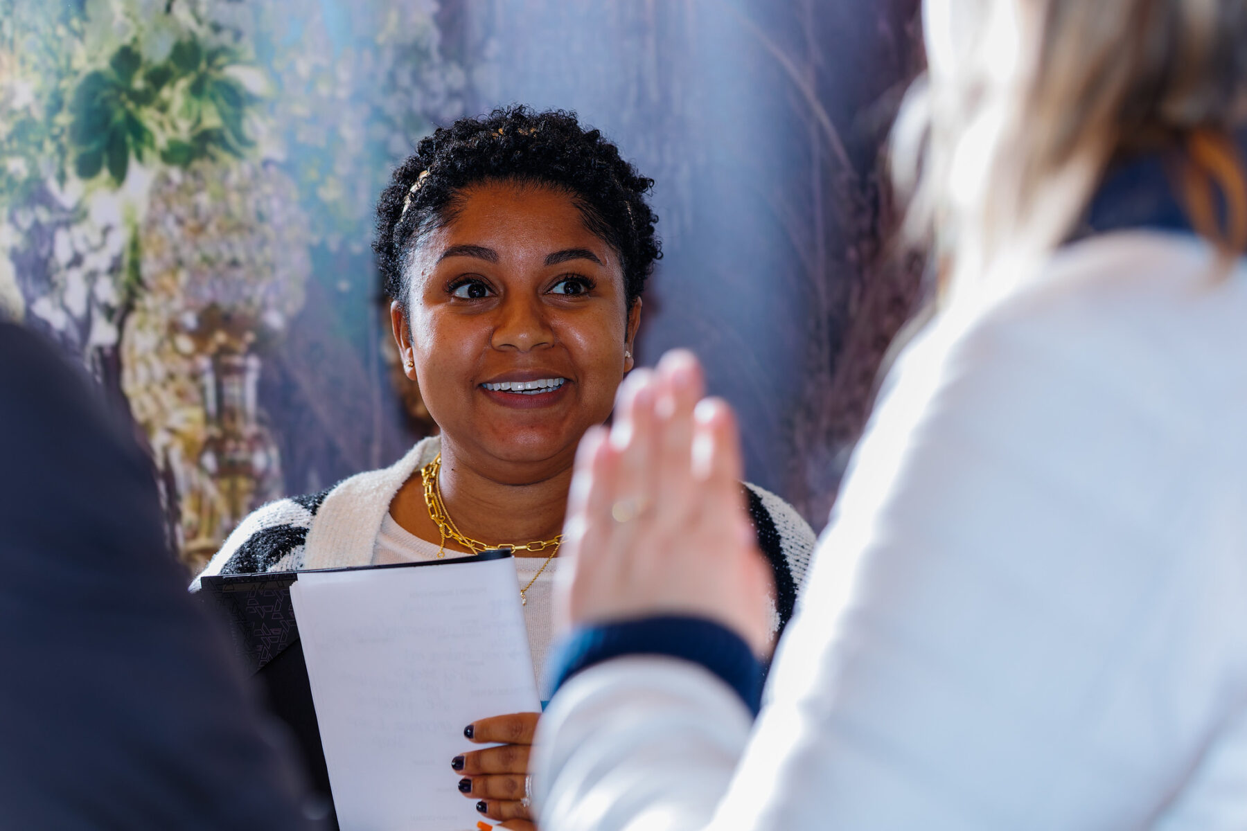 visitor asking questions about wedding at Seneca Lodge Winter Open House
