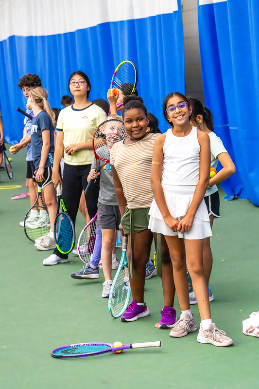 Smiling campers at tennis camp