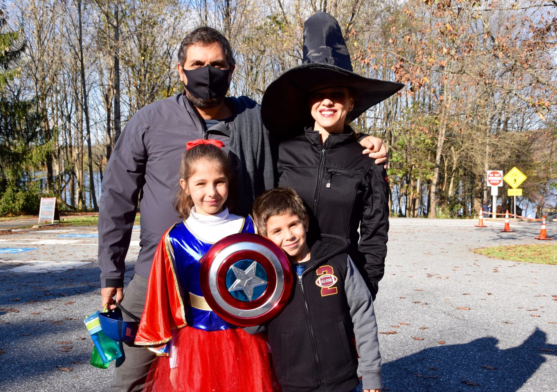 family wearing halloween costume
