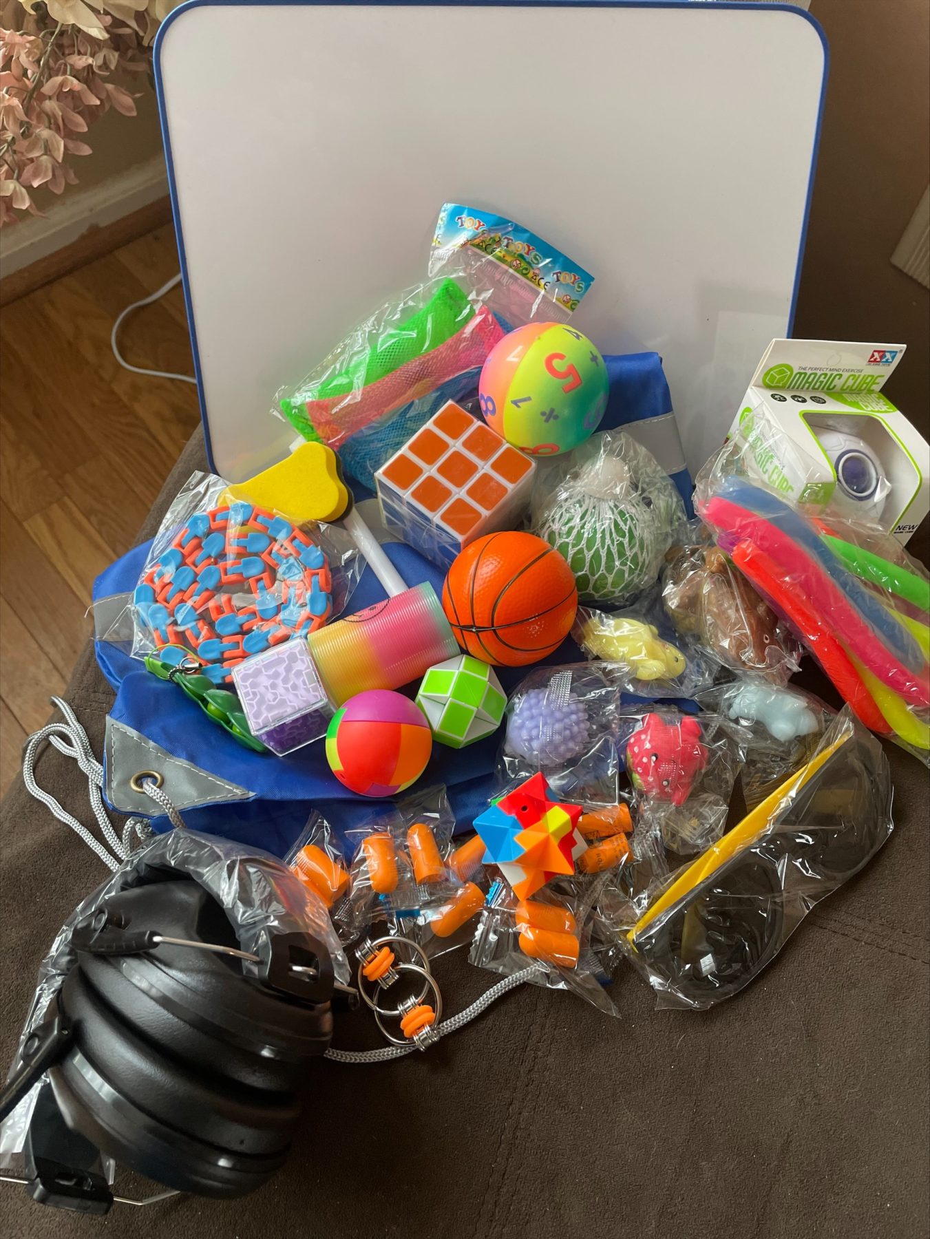 sensory bag featuring fidget toys and items to help calm stressed persons.