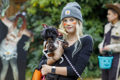 Teen and dog in Halloween Costumes