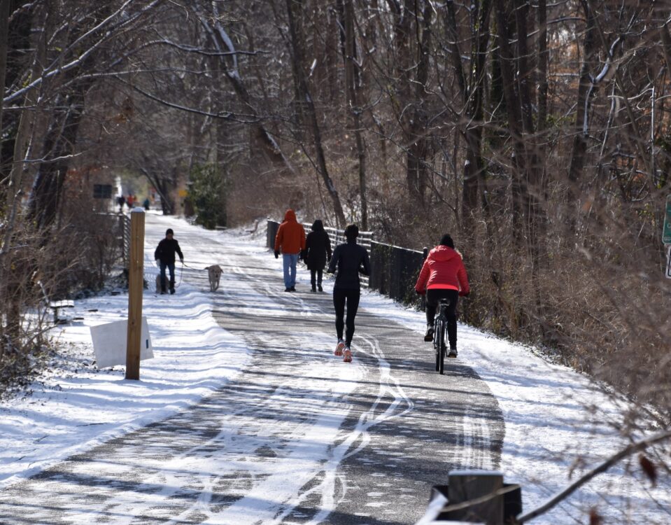people walking, running, biking little falls trail in the snow