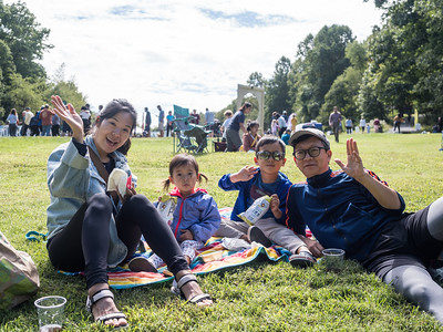 family enjoying park