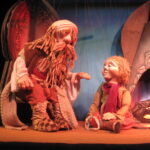 Stills of the puppets onstage from the puppet co's peter and the wolf