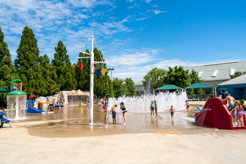 A wide view of South Germantown SplashPark shows several water features