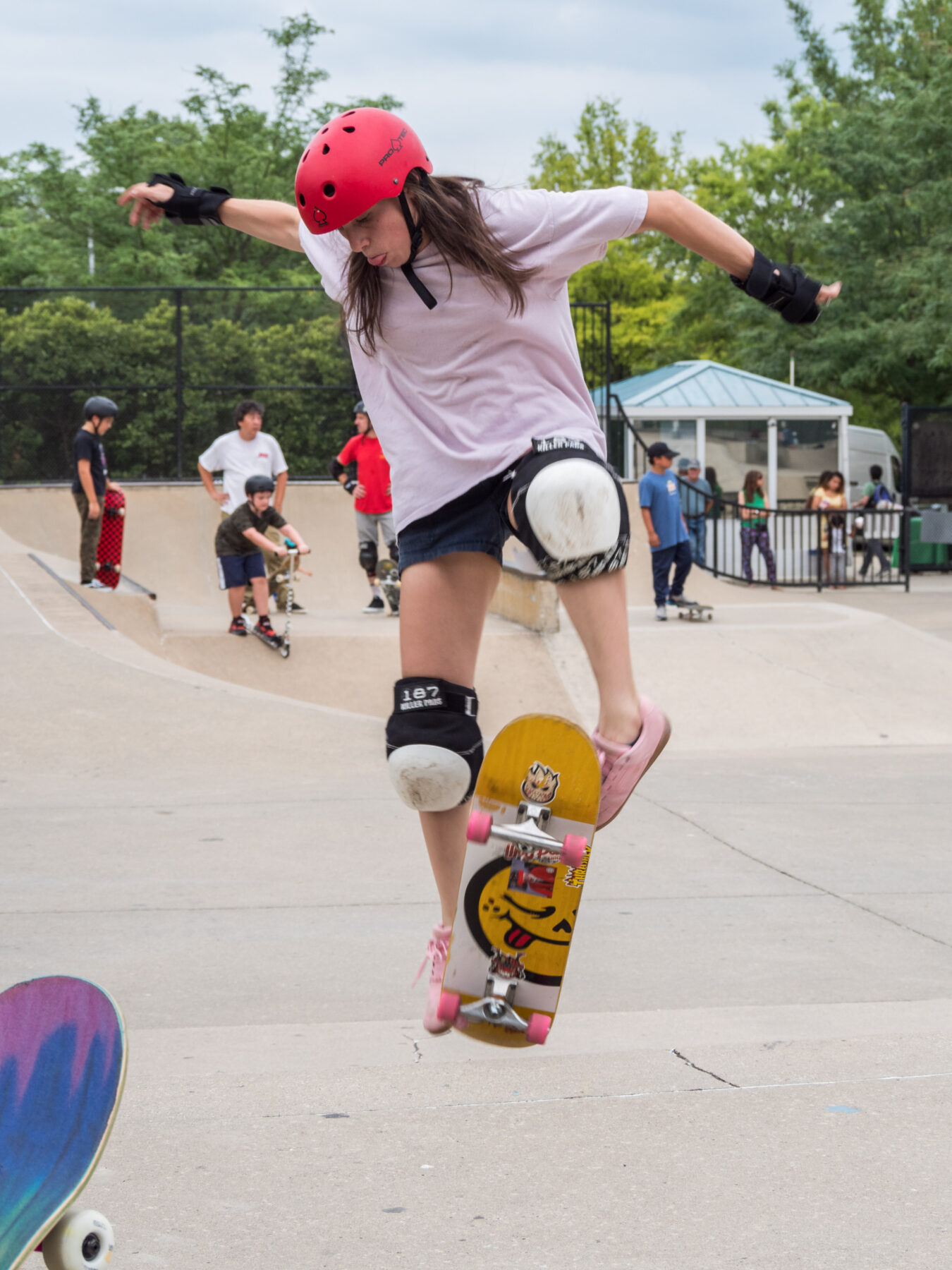 Skateboarder doing skateboard trick.
