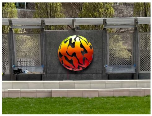 sphere with yellow and orange birds art contest gene lynch park