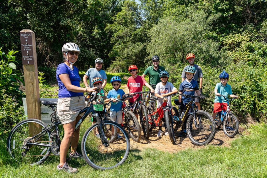 kids and parents riding on Montgomery parks trails