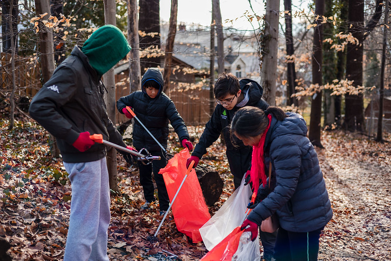 A group of volunteers removing trash from our parks for MLK Day.