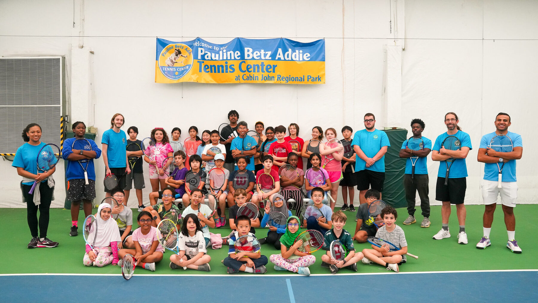 A tennis summer camp group photo