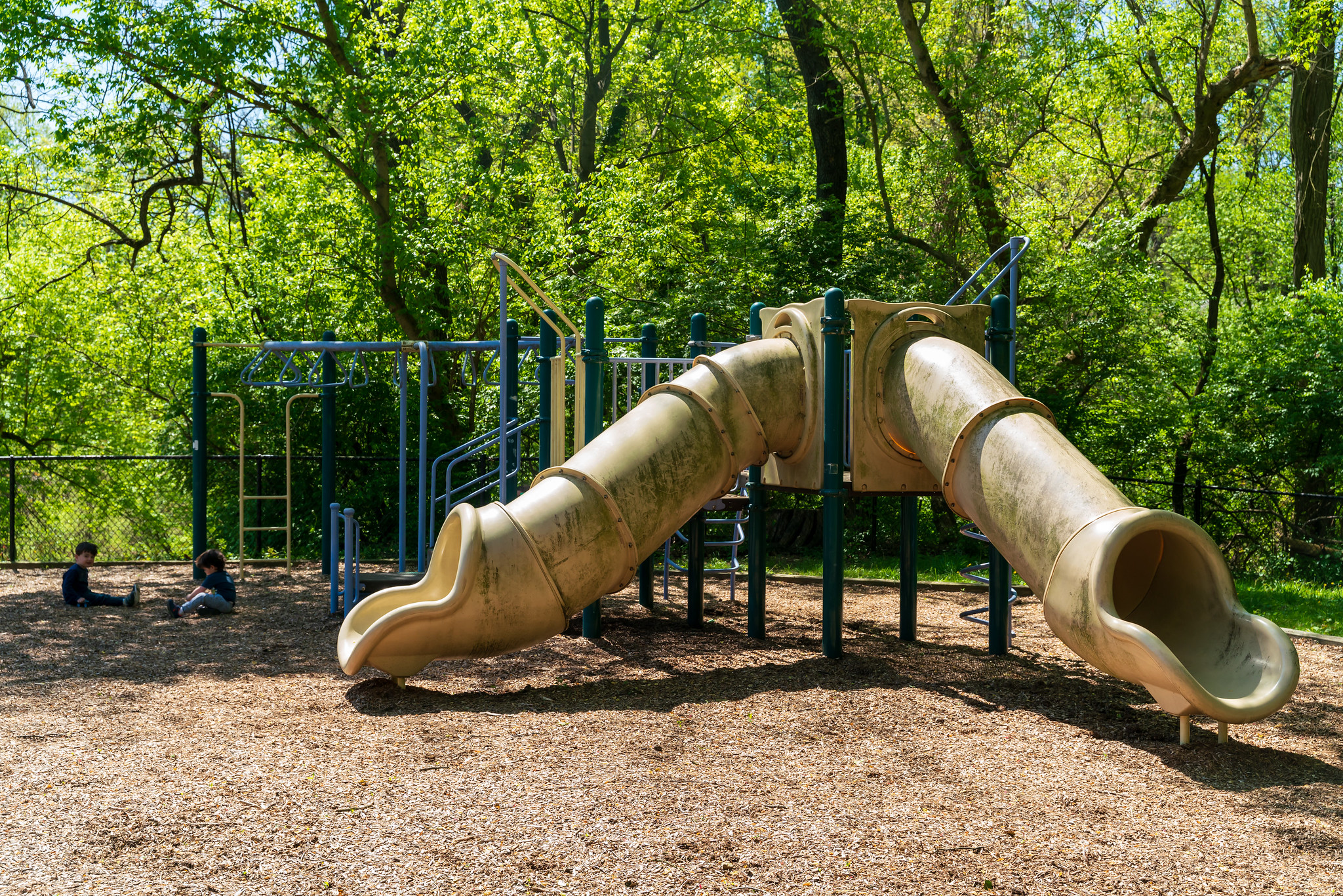 playground with two yellow slides at Ken-Gar Palisades Local Park