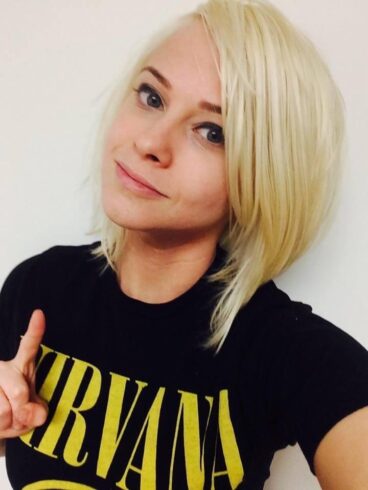 rose vineshank headshot with her in a Nirvana t-shirt