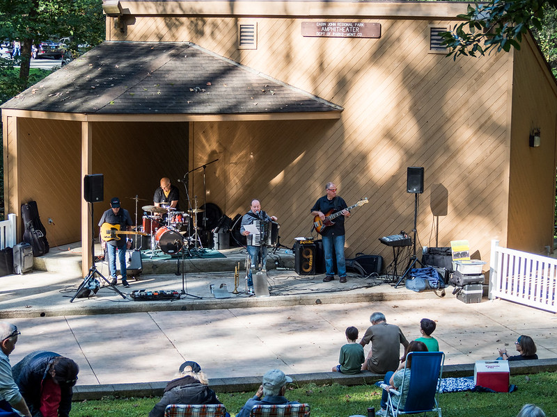 band on the stage at Sunday Serenade April 2024 Cabin John Regional Park