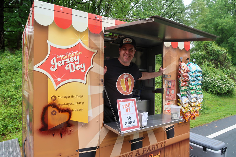 Hot dog vendor smiling