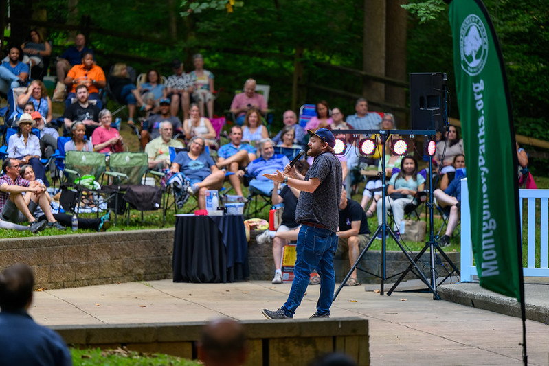 Comedian telling jokes wide shot